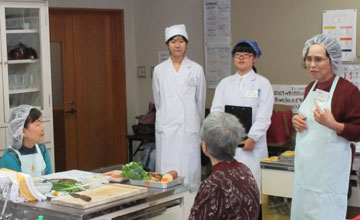 挨拶する中村会長 挨拶する中村会長